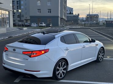 Kia: Kia Optima – ağ rəngli, zərif sedan Xarici xüsusiyyətlər: - Aqressiv — 6