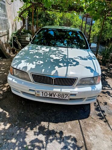 диски литые р14 на ниссан: Ağ rəngdə olan bu Nissan Maxima sedanı rahat və etibarlı nəqliyyat