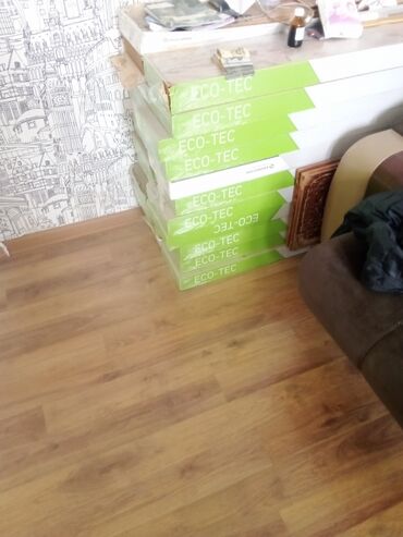 asma tavan qiymətləri: Laminat 50 kvadratdan çoxdu pakovkada açılmayıb. kvadrati on