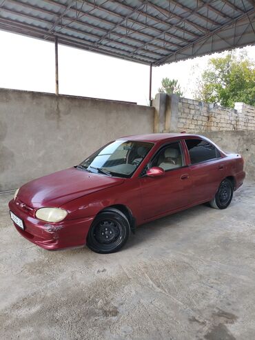 Kia: Kia Sephia: 1.6 l | 1998 il Sedan — 4