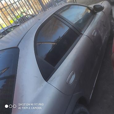 Дроссельные заслонки: Дроссельная заслонка Daewoo 2000 г., Б/у, Оригинал — 19