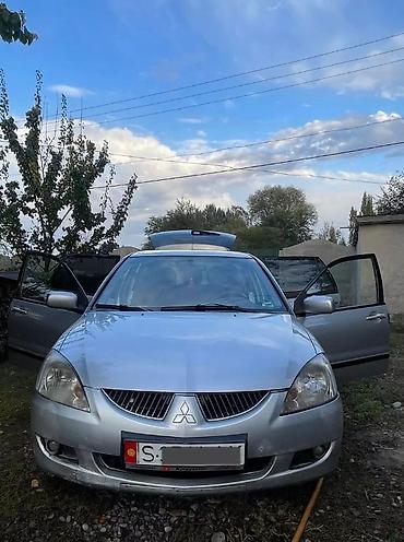 e klass: Mitsubishi Lancer: 2004 г., 1.6 л, Механика, Бензин, Универсал — 2
