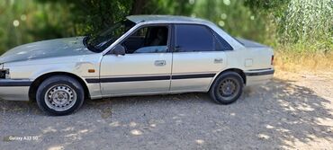 измеритель краски на авто: Mazda 626: 1989 г., 2.2 л, Механика, Бензин, Седан