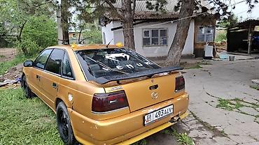 Mazda: Mazda 626: 1988 г., Механика, Седан — 7