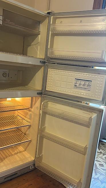 metbex soyuducu: White-Westinghouse 3 qapılı soyuducu. Motor işləyir, qaz sızması var — 1