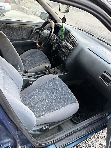 Унаа сатуу: Nissan Primera: 1997 г., 2 л, Кол менен иштөөчү, Бензин, Универсал — 5