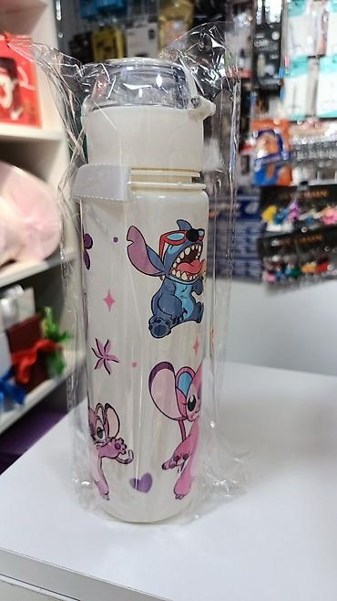 plastik qablar: Stitch temalı uşaq su qabı - Həcmi: təxminən 500–700 ml (uzun, dar — 1