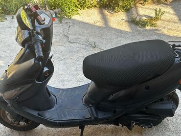 islenmis motosikletlerin satisi: Moped Otur surdur.Hec bir prablemi yoxdu Muherrikin Hecmi 50 kubdu