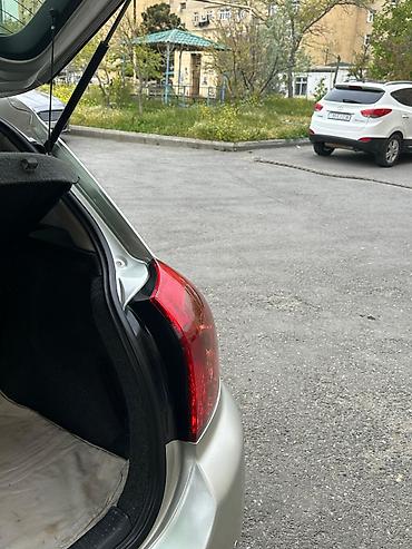 Toyota: Toyota Corolla hatchback (E120), gümüşü rəng. - Kuzov: 5 qapılı — 14