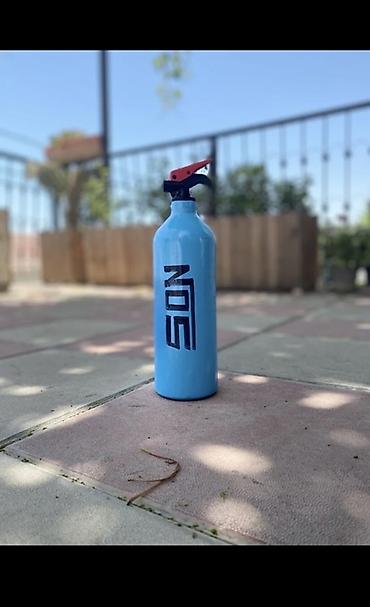 esvicin sprey: Mavi rəngli metal sprey butulka – “NOS” loqolu - Material: möhkəm — 1