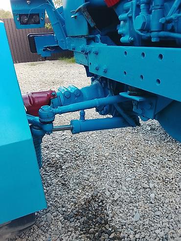 tractor belarus 1221: Mavi rəngli təkərli kənd təsərrüfatı traktoru. Xüsusiyyətlər: - Ön və — 5