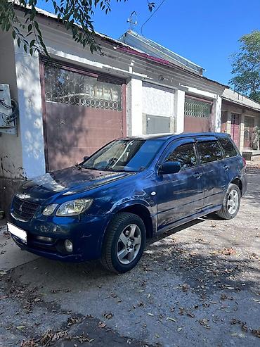лансер универсал: Mitsubishi Airtrek: 2003 г., 2.4 л, Бензин, Универсал — 2