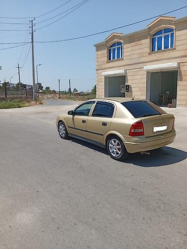 moto usta: Opel Astra: 1.4 l | 2005 il 33000 km Sedan — 4