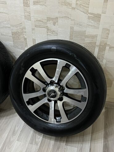 Disk təkərlər: 4 ədəd yığılmış disk+şin dəsti - Disklər: yüngül lehimli, 10-şüalı — 4