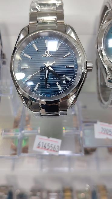 Aksesuarlar: Omega saatları – kolleksiya 1) Omega Speedmaster Professional “Snoopy — 7