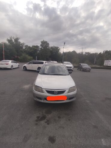 мазда кроссовер: Mazda 323: 2003 г., 2 л, Механика, Дизель, Универсал