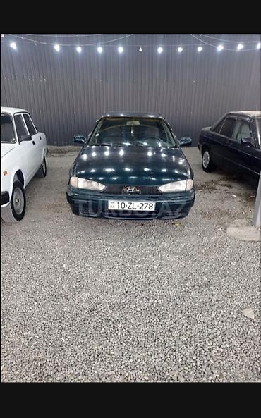 excel hyundai 1994: Hyundai Elantra: 1.5 l | 1995 il Sedan — 1
