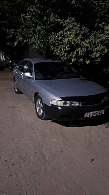 мазда трибуте: Mazda 626: 1993 г., Седан