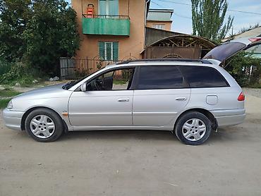 merc w210: Toyota Avensis: 2003 г., Бензин — 2