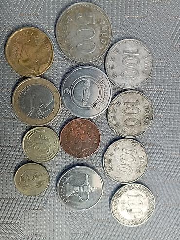 Монеты: Набор жетонов и монет: - 2 жетона «Евромойка» для автомойки — 18