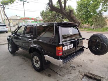 эвакуатор кран: Чёрный внедорожник Toyota 4Runner с хромированными бамперами и
