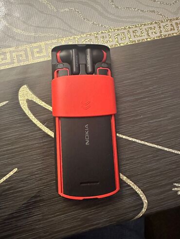 стационарный телефон: Nokia 5700, 4 ГБ, цвет - Черный, Кнопочный
