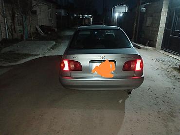 Toyota: Toyota Corolla: 1.6 л | 1999 г. Седан — 4