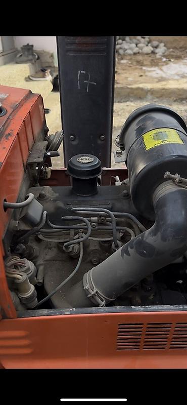 Мини-тракторы Hinomoto: Трактор Hinomoto E2304 - Компактный японский трактор на дизеле, 4x4 — 4