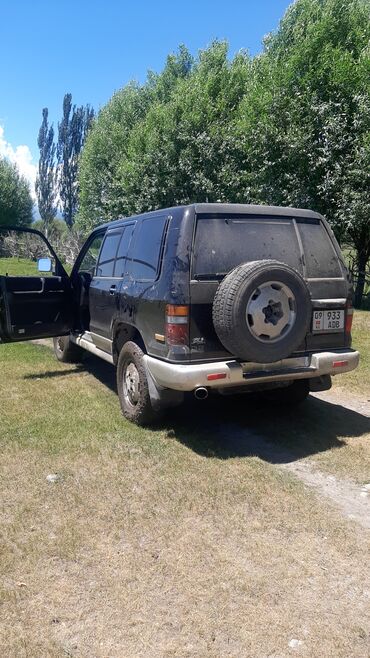 вариант машины: Isuzu Trooper: 1993 г., 3.2 л, Механика, Газ, Внедорожник