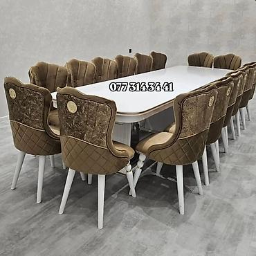 Zövqlü və iri ölçülü yemək masası dəsti. Dəstə uzun düzbucaqlı formalı