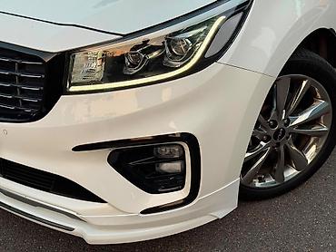 Kia: Kia Carnival: 2021 г., Минивэн — 21