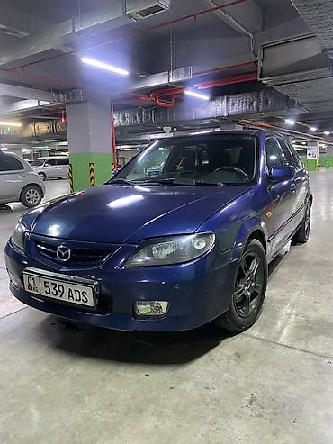 familia: Mazda Familia: 2000 г., Механика, Бензин, Хэтчбэк — 3