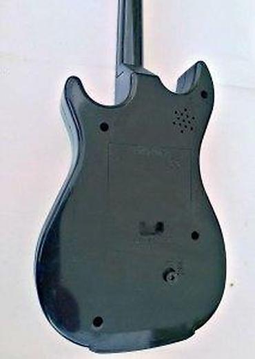Gitare: Fender Stratocaster Zidni Sat. Fender Stratocaster Zidni Sat. Dužina — 15