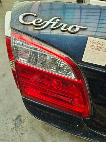 задние фары ниссан: Фонарь заднего хода Nissan Cefiro A33 2.0 2002 задн. лев. (б/у)