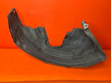 Подкрылки, брызговики, защита днища: Подкрылок колесной арки черного цвета, изготовленный из прочного — 2