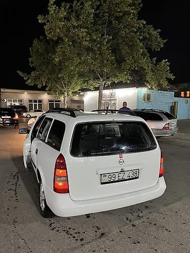 opel astra maşın: Opel Astra Caravan (ağ), universal kuzov - Geniş yük və sərnişin — 6