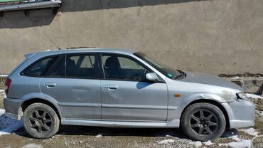белая mazda: Mazda : 2003 г., 1.7 л, Механика, Бензин