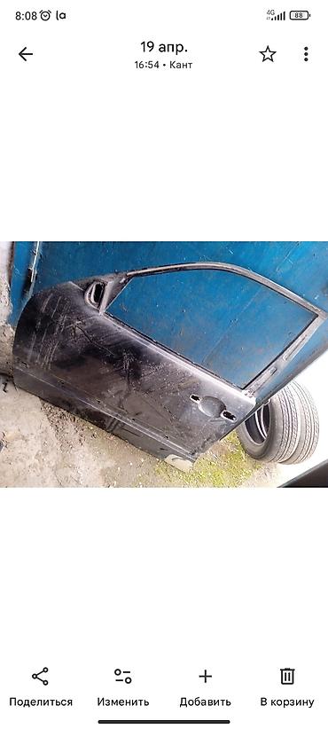 Двери и комплектующие: Предлагается черная передняя дверь для автомобиля. Дверь имеет вырез — 2