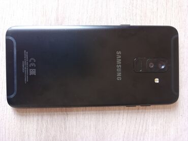 samsung r40 plus: Samsung Galaxy A6 Plus, 32 ГБ, цвет - Черный, Сенсорный, Отпечаток пальца, Две SIM карты