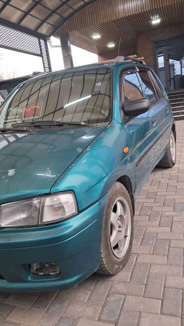 Mazda: Mazda Demio: 1999 г., 1.3 л, Механика, Бензиновая, Хэтчбэк — 9