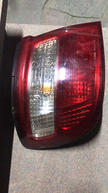 химия авто: Левый поворотник Nissan 1998 г., Б/у, Оригинал — 1