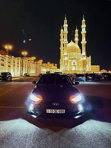 ravon 2: Hyundai Elantra: 2 l | 2016 il Sedan — 1