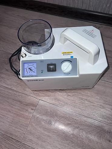 Детская гигиена и уход: Переносной отсасыватель мокроты Yuwell (Portable Phlegm Suction Unit — 3
