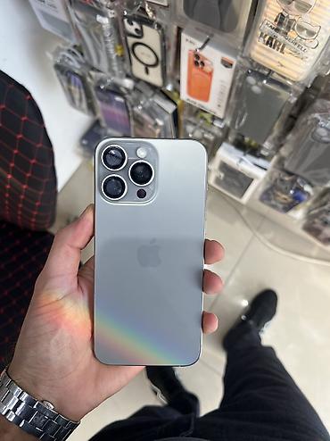 islenmis iphone: IPhone 15 Pro Max, 256 GB, Natural Titanium, Zəmanət, Simsiz şarj, Face ID — 7