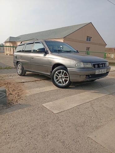 Opel: Opel Astra Caravan (şunur kuzov) Xüsusiyyətlər: - Kuzov — 11