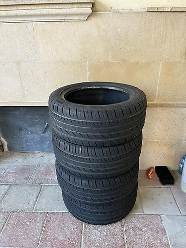 Təkərlər: 4 ədəd avtomobil şini - Növ: Yay (asfalt üçün) - Protektor dizaynı — 13
