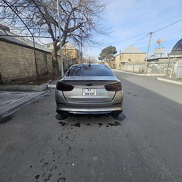 kia optima spoyler: Kia Optima Turbo – sedan Xüsusiyyətlər: - Turbo benzin mühərriki — 9