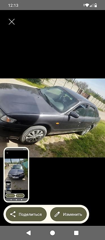 124 2 2: Mazda 626: 1999 г., Механика, Седан — 4