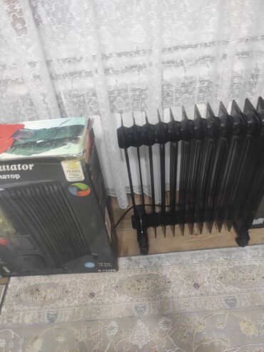 кондиционеры напольные: Продаю обогреватель масляный новый 13 секции,в упаковке цвет черный