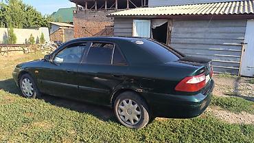 х2 00: Mazda 626: 2000 г., 2 л, Механика, Бензин, Седан — 5